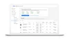 Laptop screen shows the price insights tool within Google Merchant Center, which includes suggestions for how to price products more effectively.