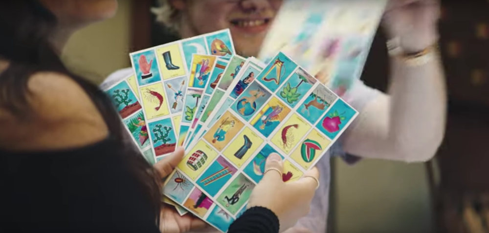 YouTube video featuring behind the scenes footage of Mexican-American artists playing Loteria and creating card art.