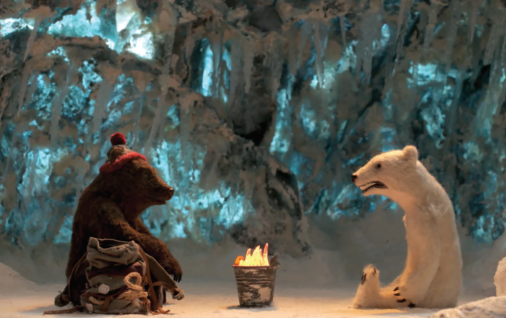 Two polar bears around a fire (animation)