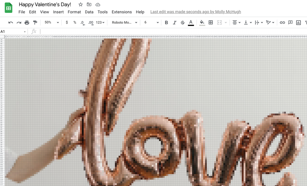 A screenshot of a Google Sheet with the title “Happy Valentine’s Day!” at the top. The pixels of the Sheet are colored in shades of gray, white, and pink to reveal a picture of a hand holding a balloon that says “love.”