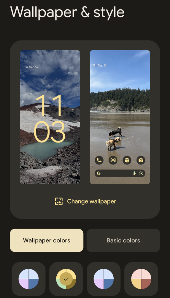 A screenshot of the "Wallpaper & style" settings on the Pixel 6a phone. It shows a preview of the lock screen (a photograph of a mountaing) and the homescreen wallpaper (a photograph of two dogs at the beach) and underneath are various color scheme options that complement the photos.