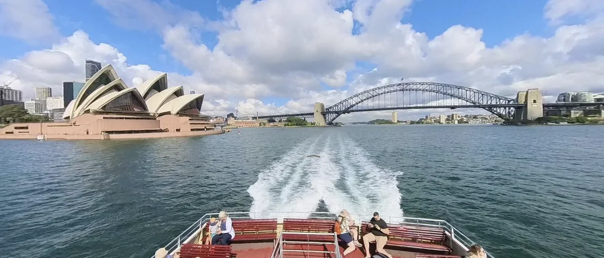 View of the Sydney Opera House and Harbour Bridge from the top deck of one of the Sydney Ferries on Street View