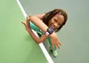 A kid on a tennis court wearing Fitbit Ace LTE