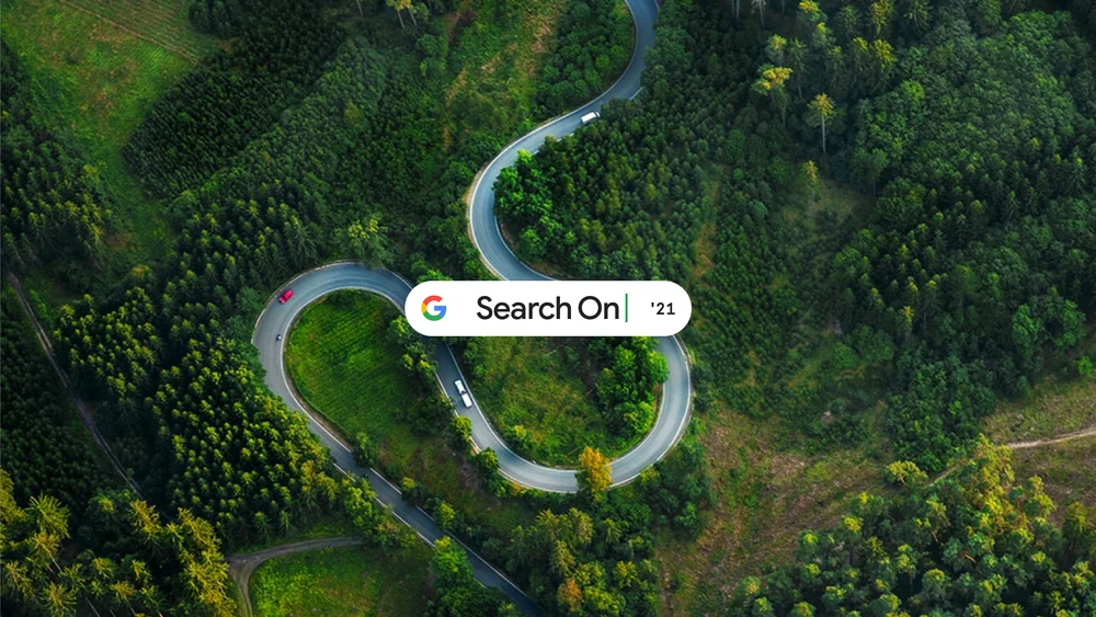 An image of a road and trees with Google's Search On logo