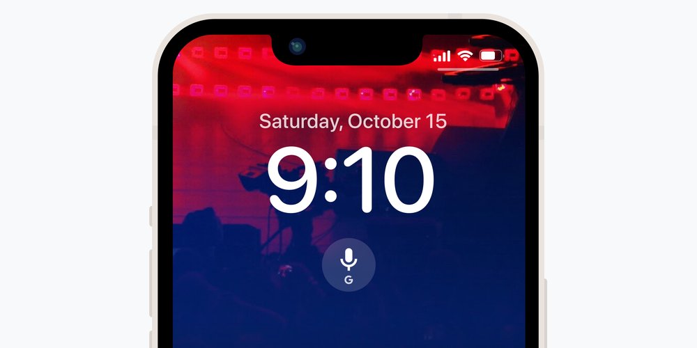 Una pantalla de bloqueo de iPhone con una foto del escenario del concierto y un widget de pantalla de bloqueo de búsqueda con un icono de micrófono configurado para la búsqueda por voz.