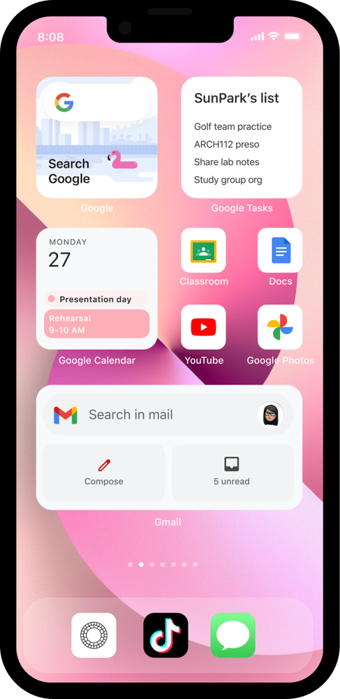 iPhone 13 with a pink background showing a widget set-up with the Google app, Keep, Gmail and Google Calendar.