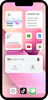 iPhone 13 with a pink background showing a widget set-up with the Google app, Keep, Gmail and Google Calendar.