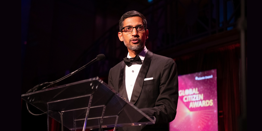 Sundar Pichai speaking at a podium