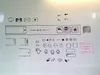 Whiteboard sketch with a row of icons indicating chat, gmail and youtube, second row of clock, back, menu and home icons, below has a series of sketches with Android bugdroid, clocks and variations of square shapes for icons. A label in the corner reads, “Android Whiteboard UI, FPO Graphics”.