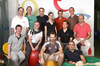 The Google Trends team in Tel Aviv; they're gathered against a wall with the word "Google" on it, smiling and looking into the camera.