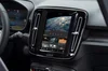 Image of car dashboard with Youtube video "Google Year in Search 202"  playing.