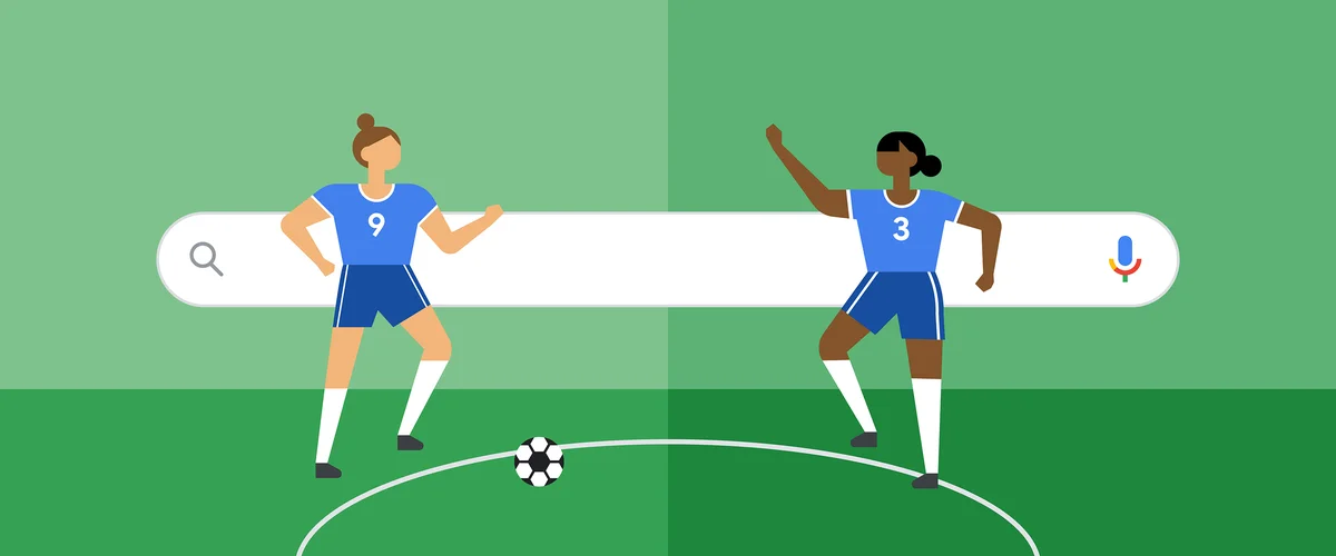 Two female soccer players in blue jerseys passing the ball to each other the the Google Search bar in the background.