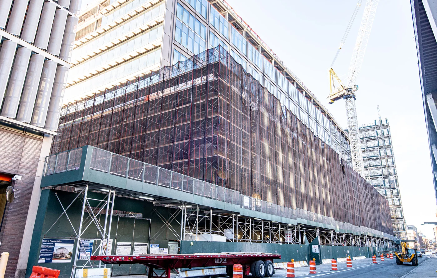 A street-level photo of a building under construction on 550 Washington St. in NYC
