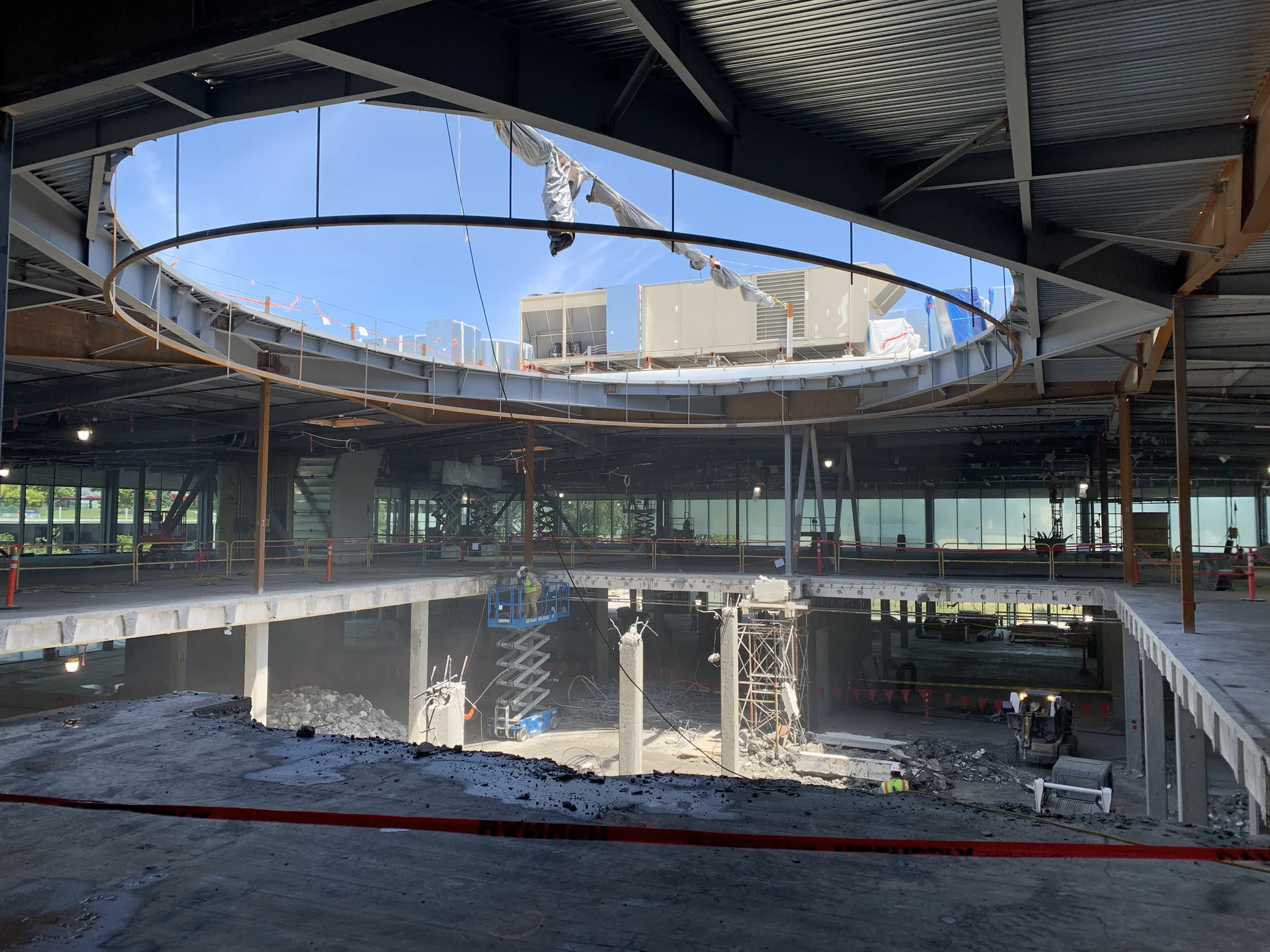 Construction space shows the interior of the building with a large oval shaped skylight.