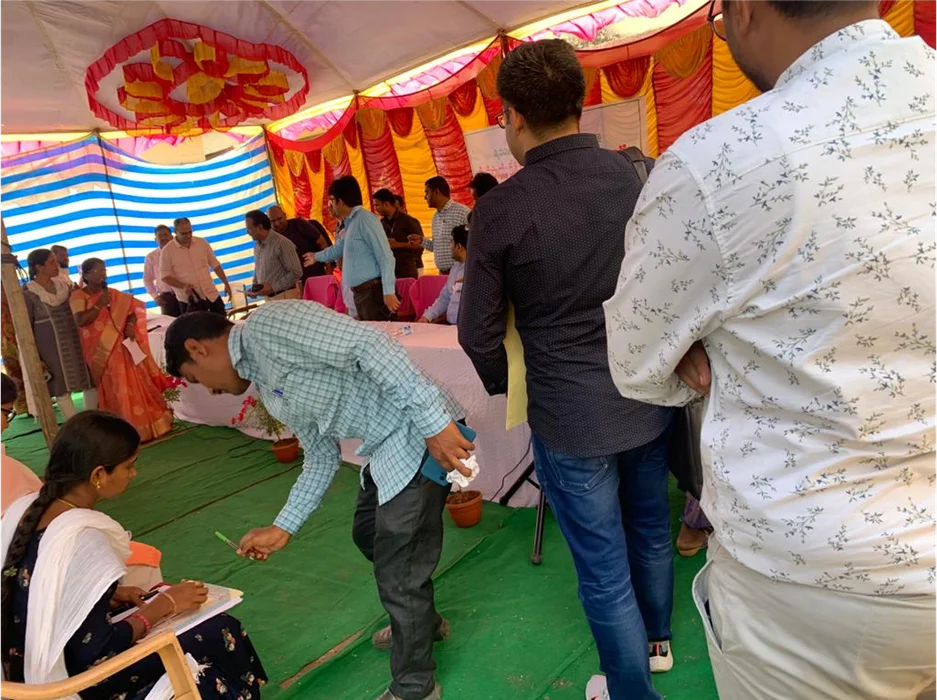 People gathering and providing feedback at an event.