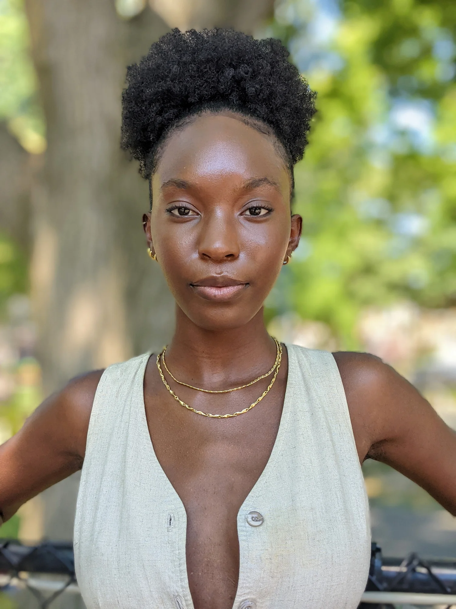 A photo shows a woman's face illuminated by Portrait Light, a new feature that helps adjust the light on a person's face.