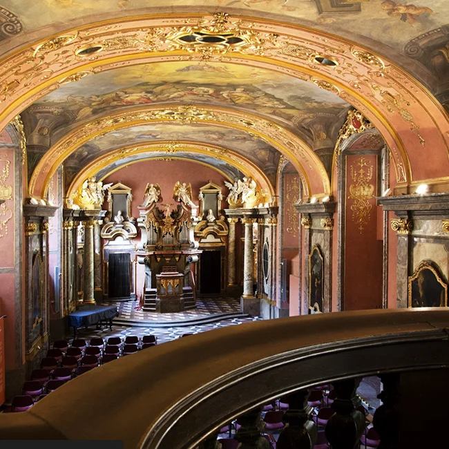 An extraordinary interior of the Mirror Chapel, for which the builders chose an impressive combination of marble, mirrors, gilded stucco decoration, frescoes and paintings. Mirrors used in the decoration of the walls and vault.