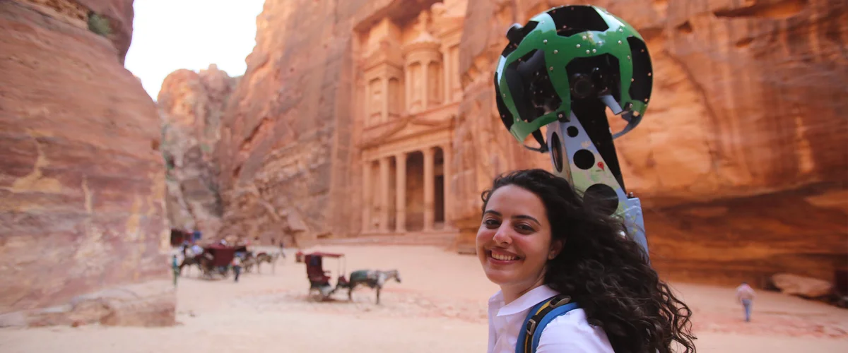 Zain with a street-view camera on her back.