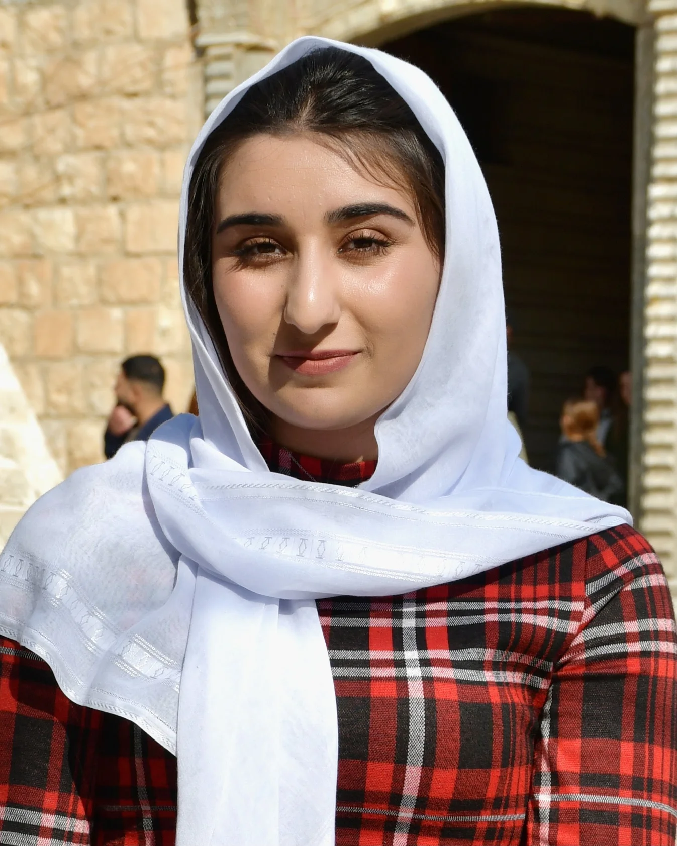 Photographic portrait of Elham, a Yazidi survivor.