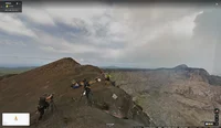 Climbers getting ready to rappel down a volcano