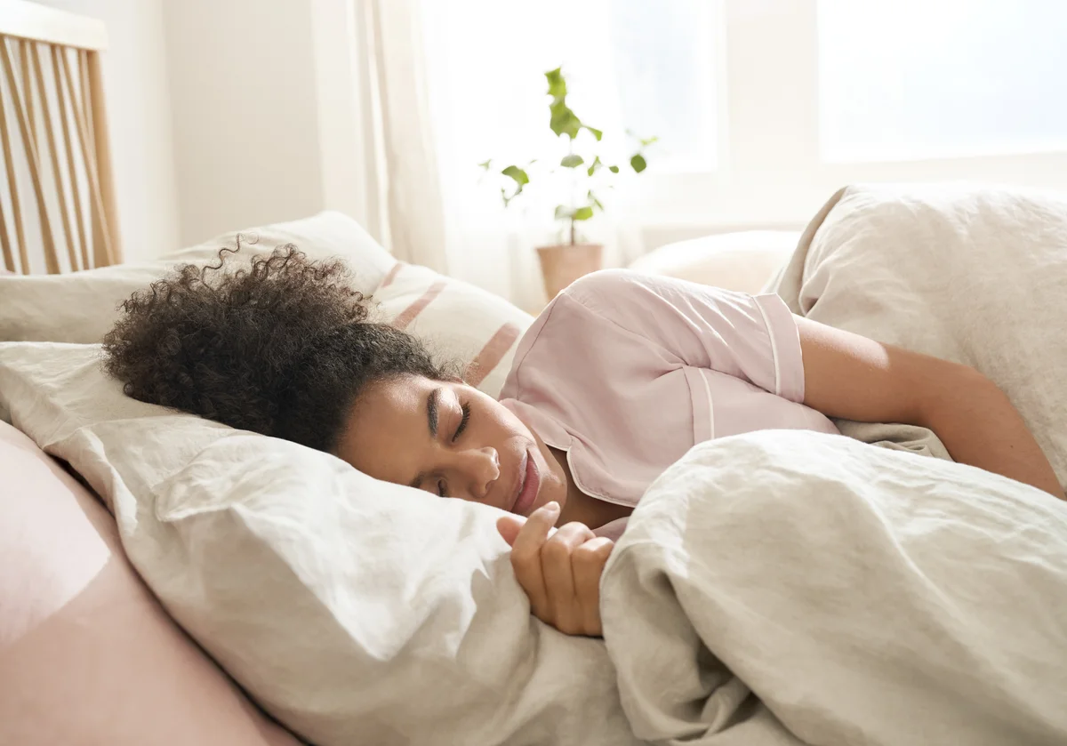 Woman sleeping in bed