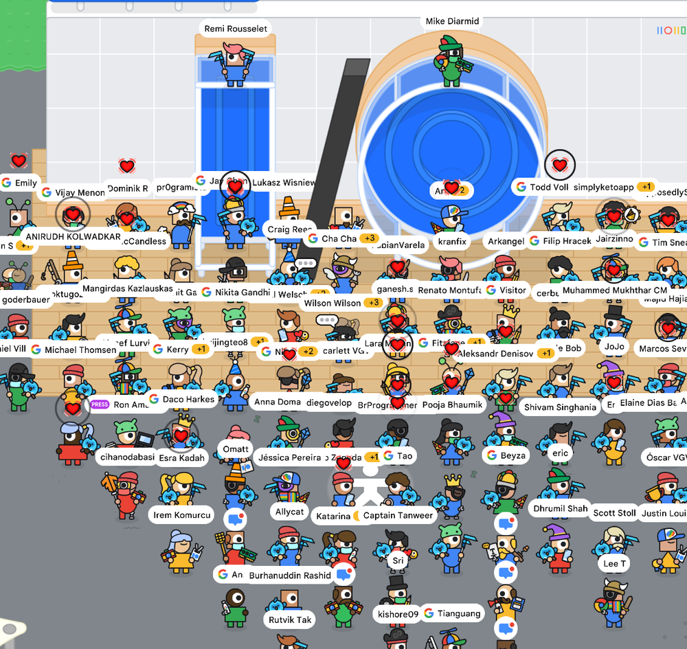 Photo showing a large group of virtual avatars in the I/O Adventure game world. Participants can earn up to 140 pieces of virtual swag.
