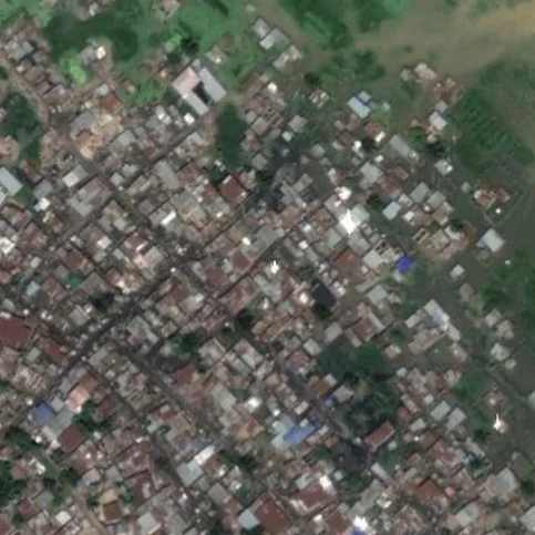 An aerial photograph of an urban area in DRC