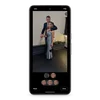 A Pixel 8 Pro showing the Best Take feature in use on the screen. There is a photo of a man in a suit with his arm around a woman in a blue dress. They are both smiling. Below the photo are two icons of their faces. The icon of the woman’s face is selected, showing three other icons of her face below it, each one slightly different. One of them is highlighted and selected, and this image matches that of her face in the final main image above.