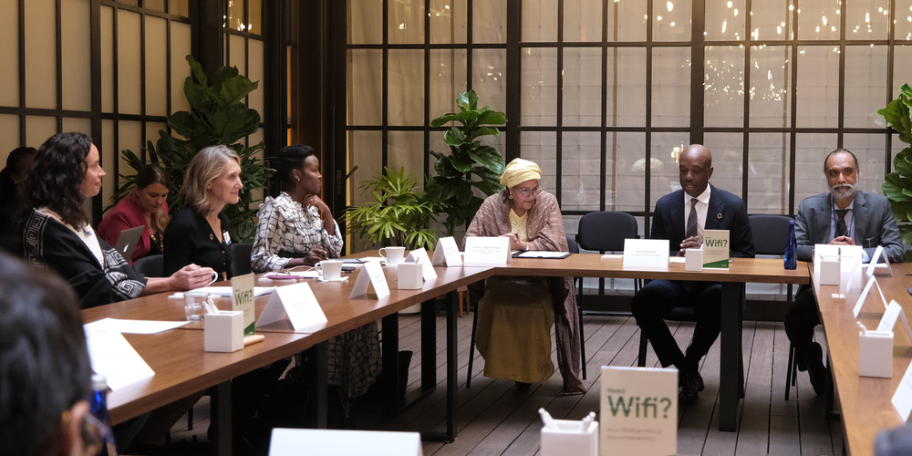 group of people seated at a conference table