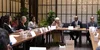 group of people seated at a conference table