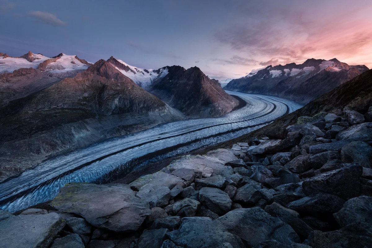 Photo of road through the mountains by Samuel Ferrara on Unsplash