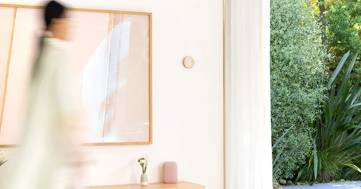 Nest Learning Thermostat displayed on wall