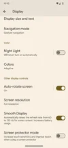 A screenshot from a Pixel phone’s Display settings page showing the Night Light option toggled on and the screen and various elements tinted an amber shade.