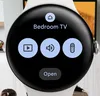 Google Home action tiles including temperature, digital key and doorbell camera shown on Pixel Watch 3 Bedroom TV action tiles for pause/play, volume and Google TV remote are shown