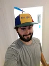 Selfie of Paul wearing a Noogler hat.