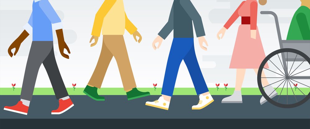 Illustration of five people walking on a path in different directions, one is using a wheelchair. We see them all only from the neck down.