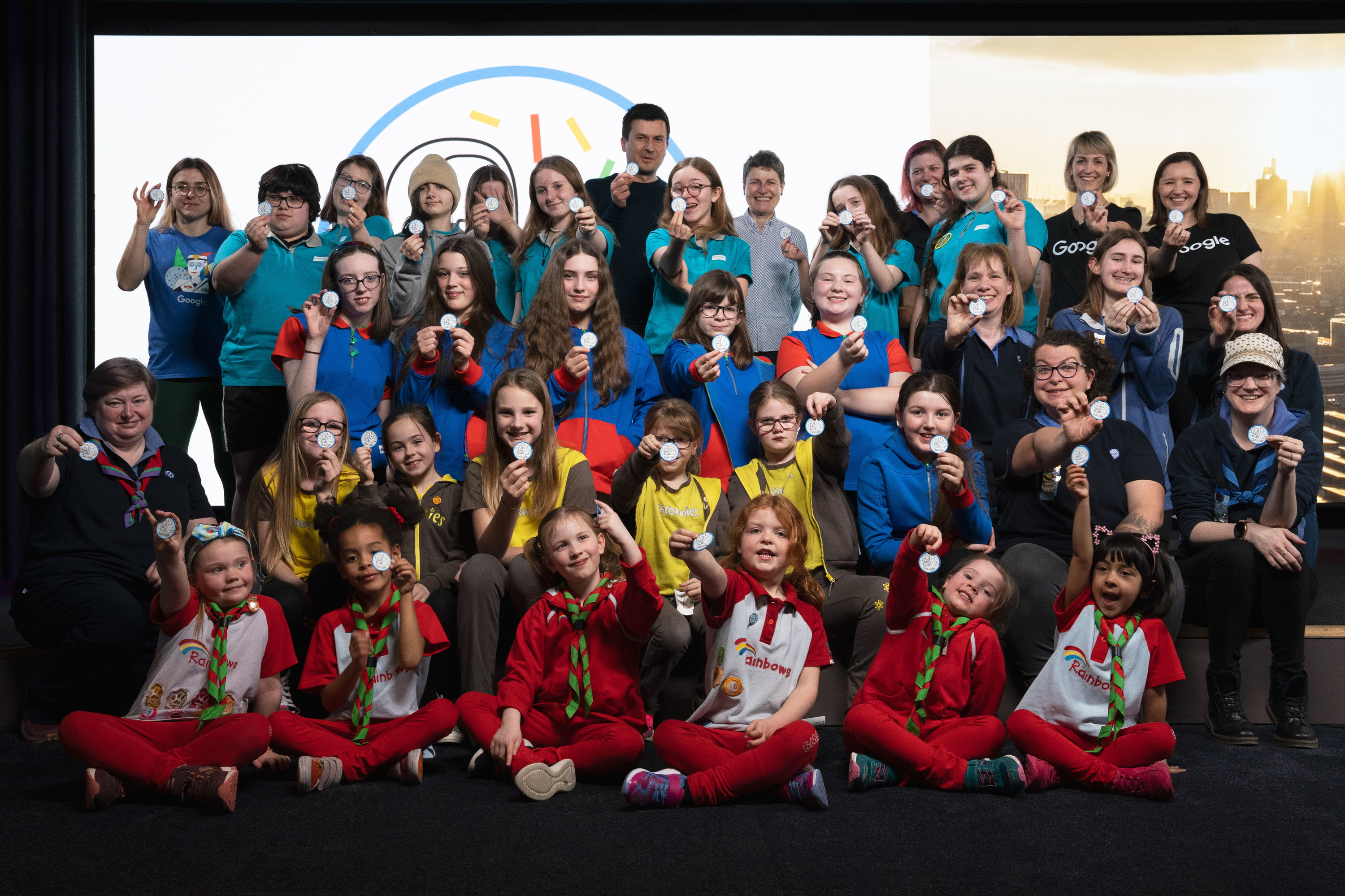 A picture of Girlguiding groups and Google engineers.