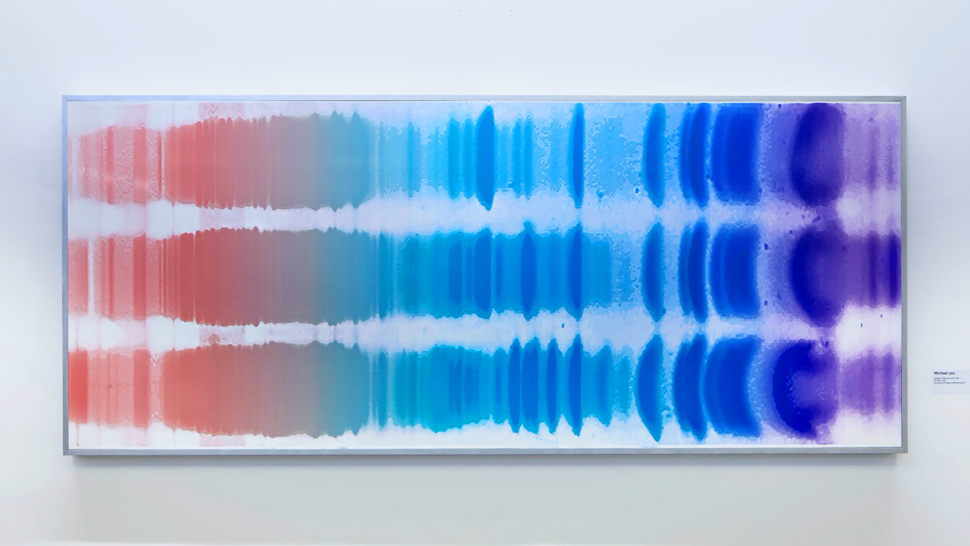 Abstract painting: silver frame, three horizontal color bands (salmon-blue-indigo), vertically segmented bars like electrophoresis gel.