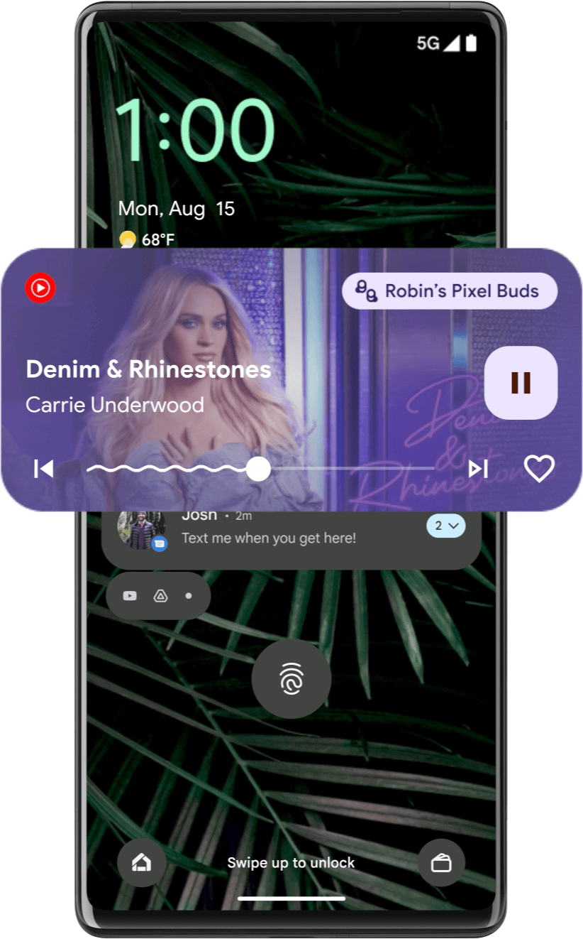 Ein Medienplayer ist hervorgehoben und zeigt einen Song von Carrie Underwood an. Der Balken für die Medienwiedergabe tanzt nach oben und unten, während der Song auf dem Bildschirm des Android 13-Geräts spielt.