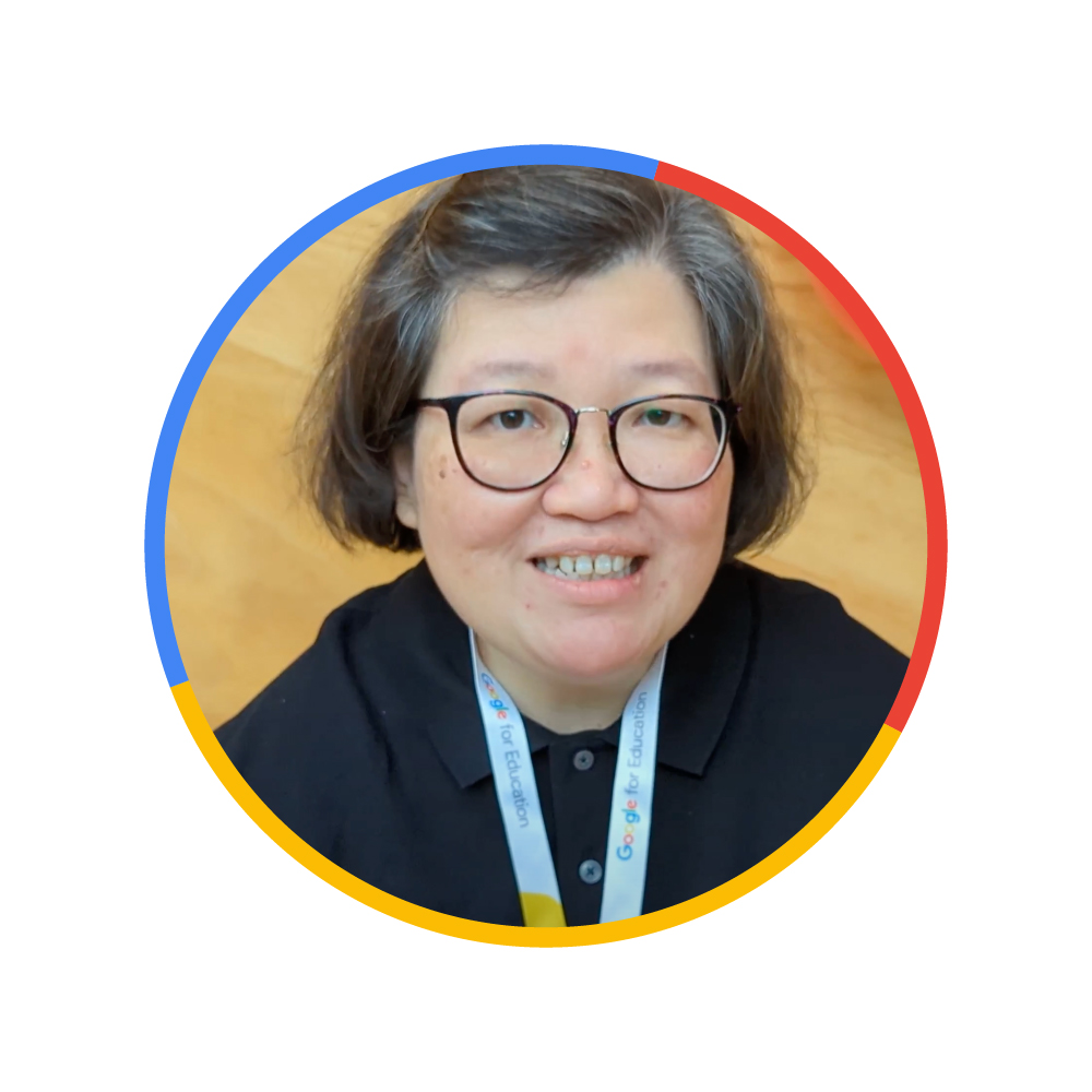 A headshot of a female educator from Indonesia wearing glasses with short, dark hair.