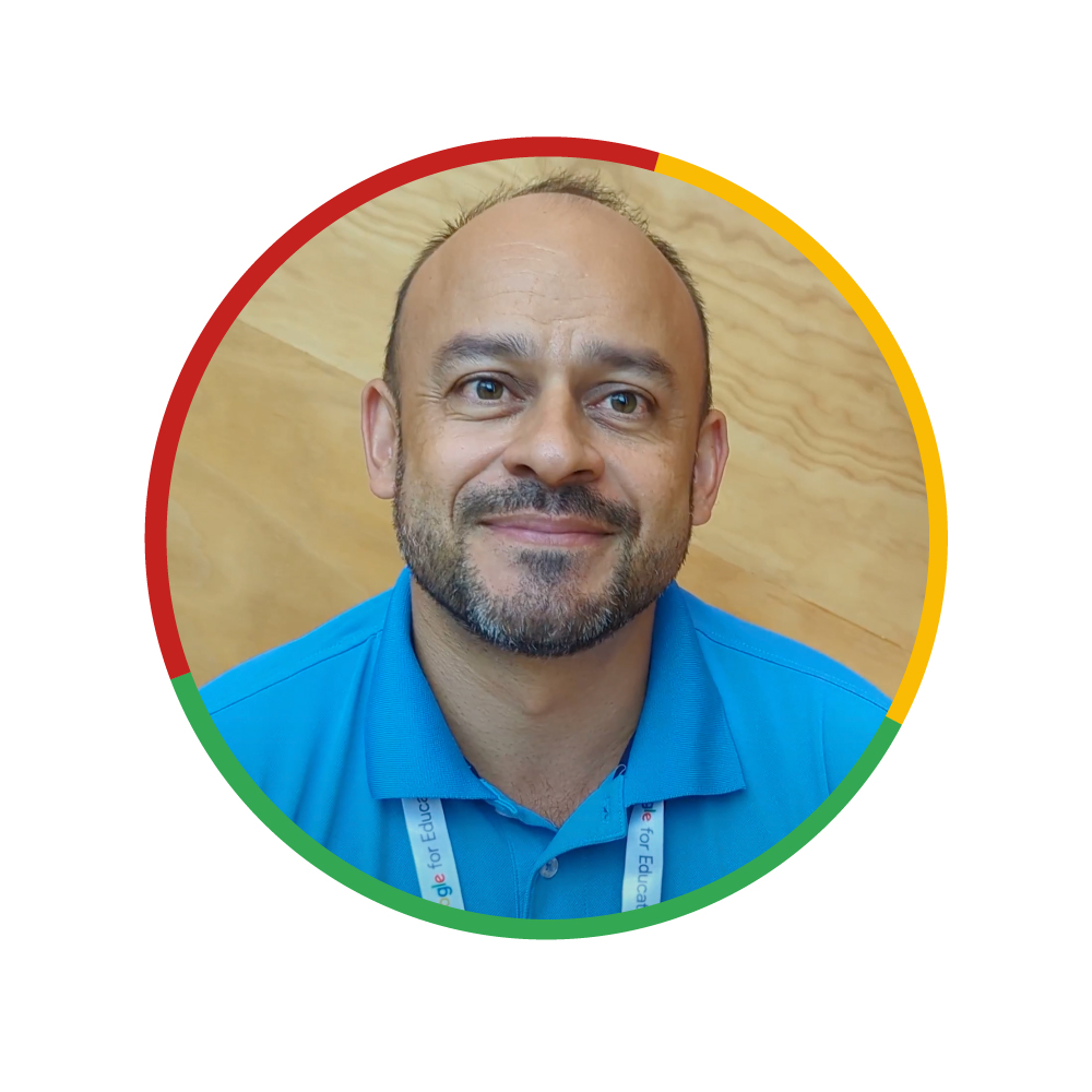 A headshot of a male educator from Vietnam wearing a blue collared polo shirt.