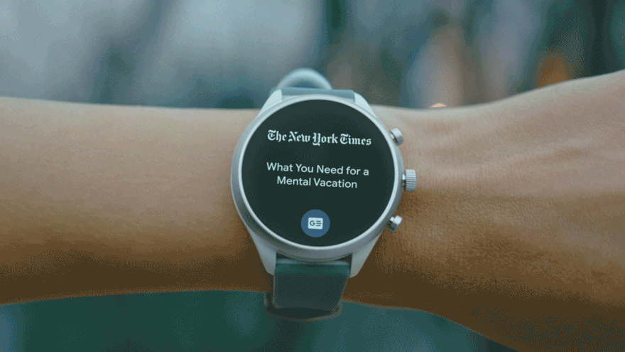Watch on wrist shows configurable Tiles.