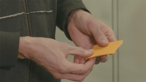 Animated GIF of pulling a sticky note off a pad