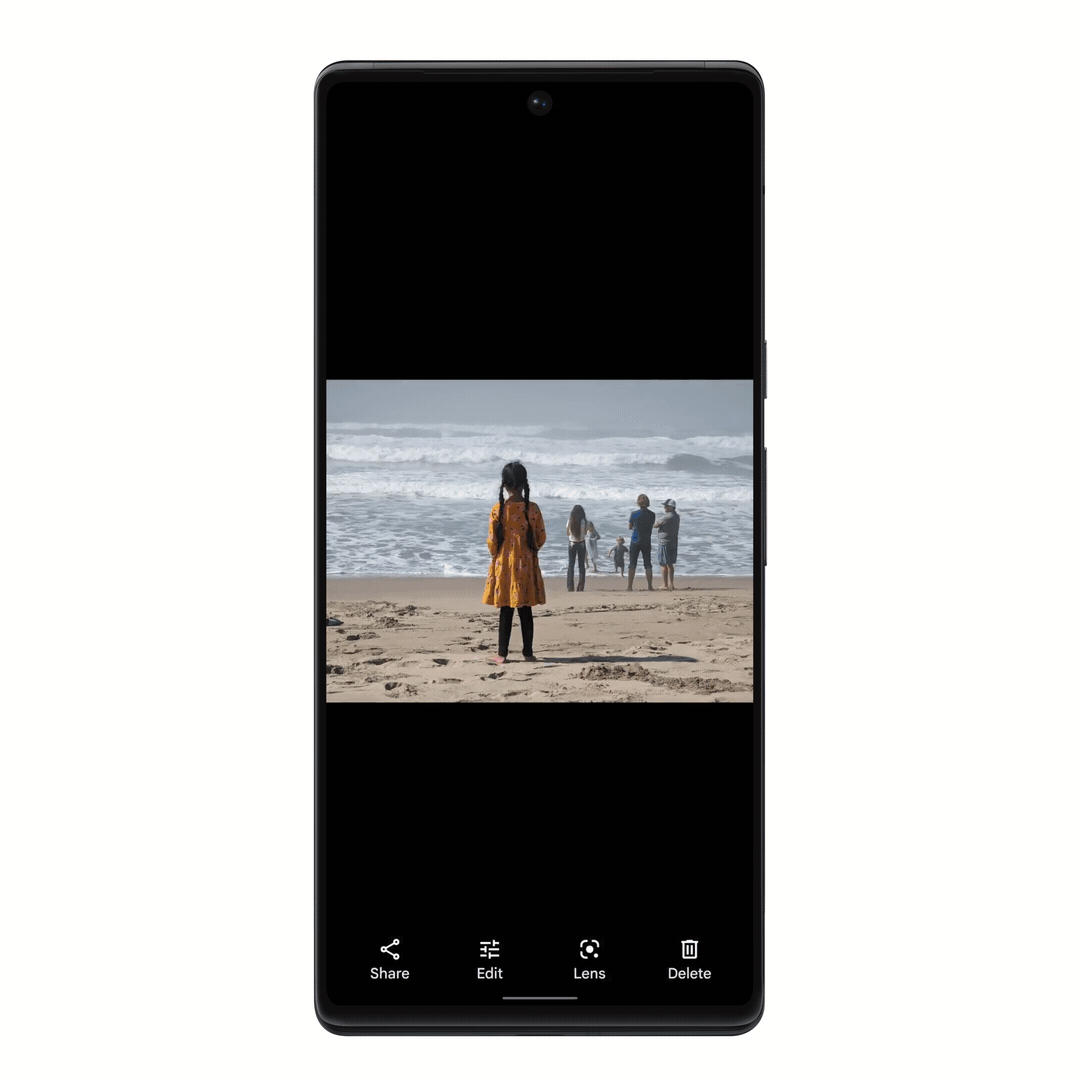 Gif showing Magic Eraser being used in Google Photos on Pixel 6 on a photo of a child on the beach with people in the background. Magic Eraser suggests to "remove people in the background," then removes them, resulting in an image with just the child on the beach.