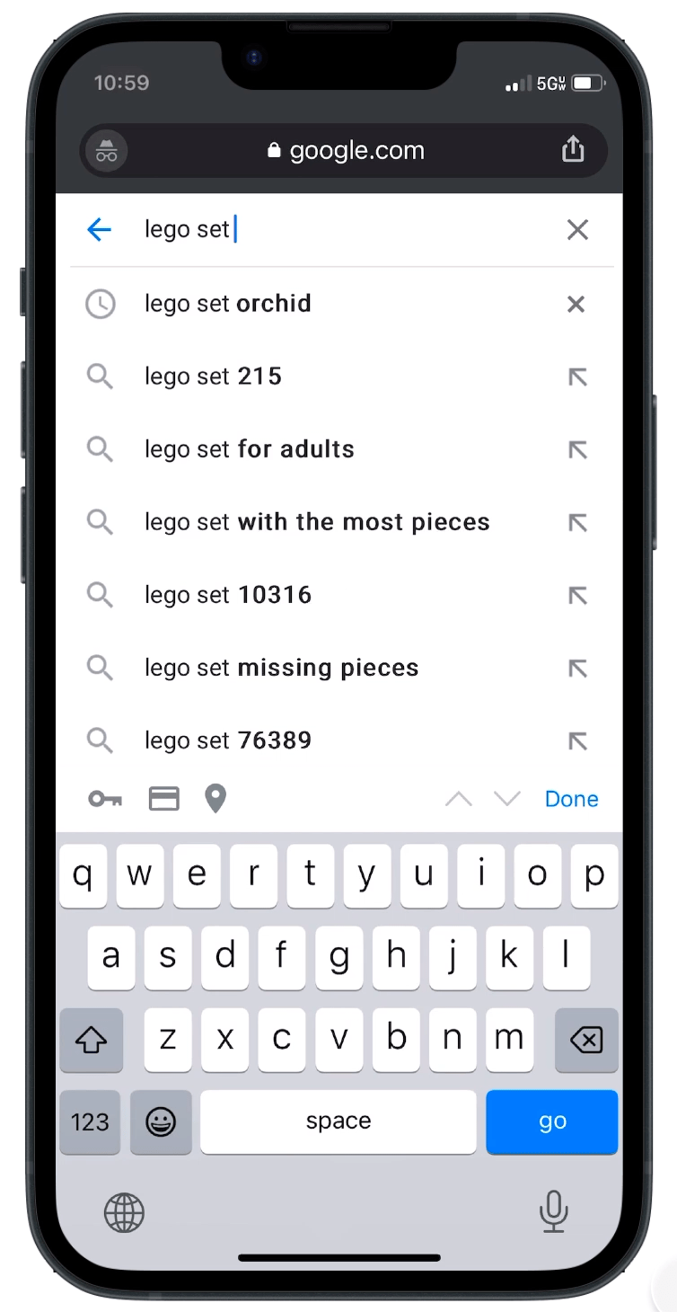 A gif of a phone screen searching for “lego set orchid.” The results show a price history graph with the historical price of that lego set, and that the typical price is $50.