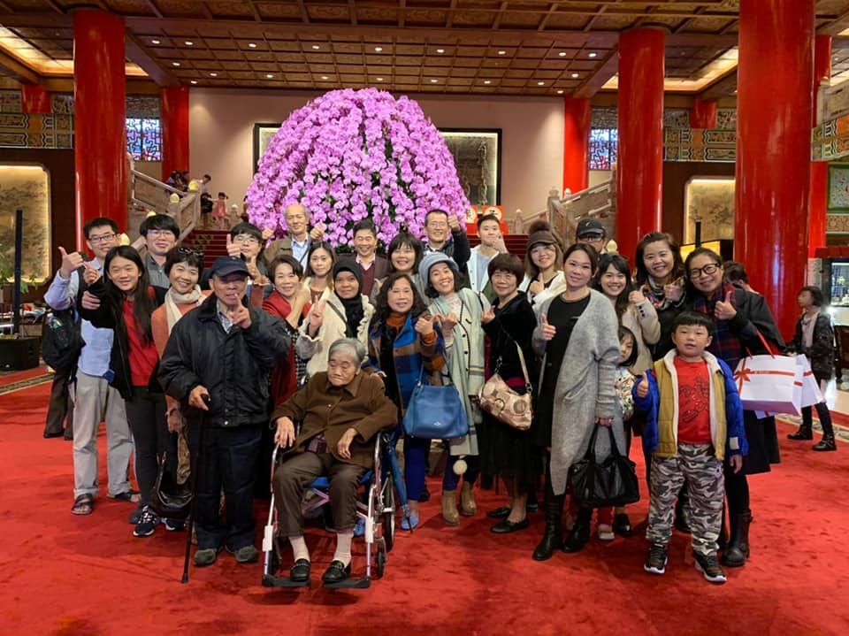 Shelly with her family in the lobby of Taiwan's famous Grand Hotel.