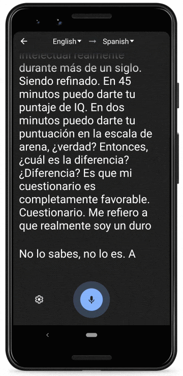 A phone showing a real-time streaming translation of English text to Spanish.