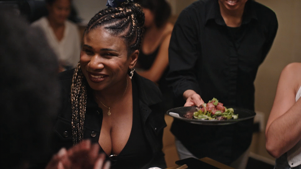 Three images of food are shown, then a plate of avocado salad is placed on table with a camera using Guided Frame counting down from 3 to take an image of the food