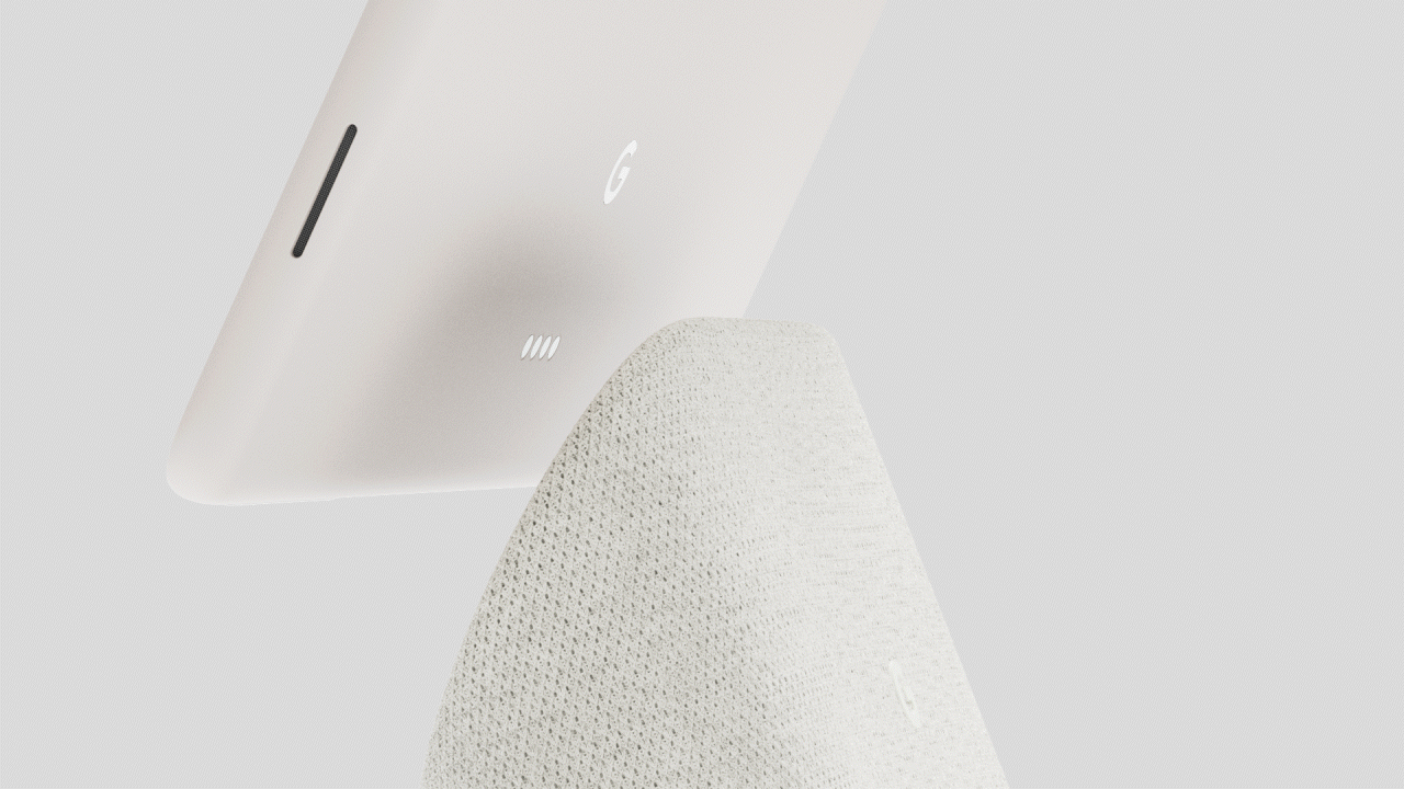 GIF of Pixel Tablet in porcelain being docked on the Charging Speaker Dock.