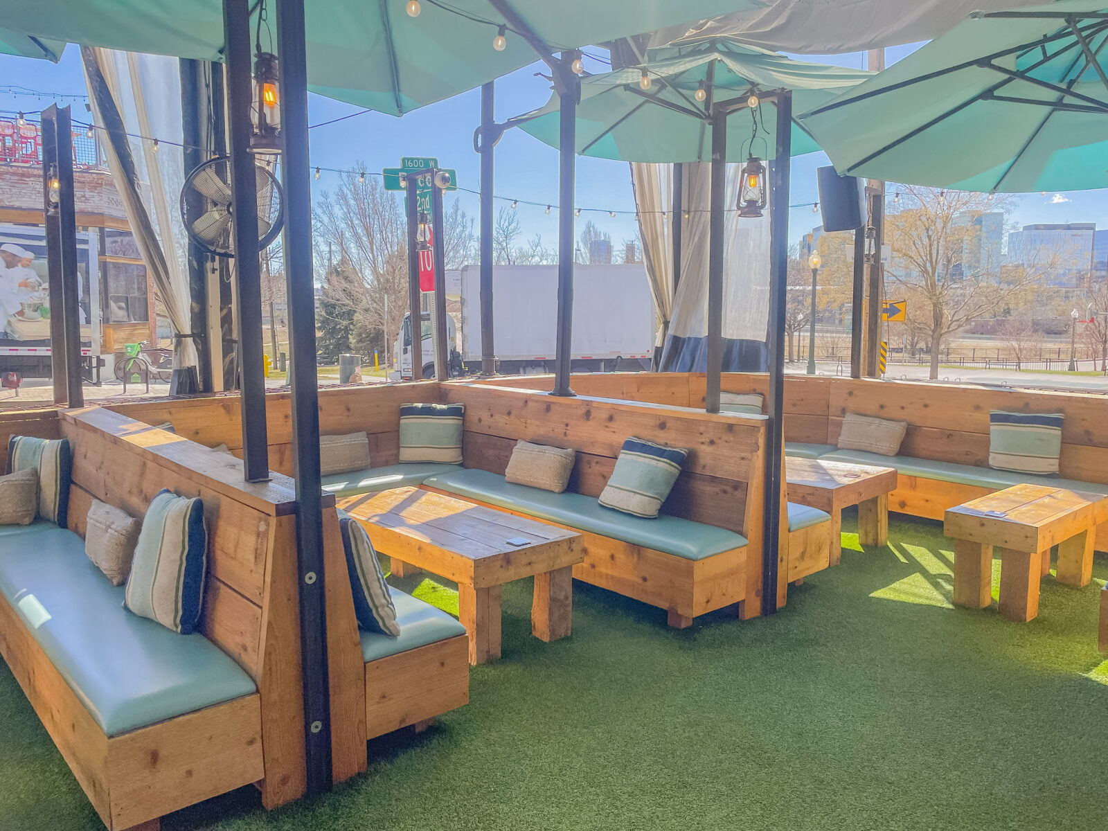 slide 3 of 3 - Cabana seating on outdoor patio space